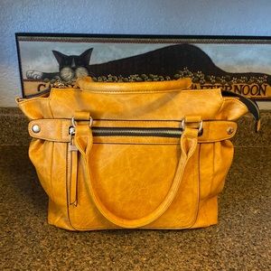 Ladies purse Med size  black zipper’s & gold hardware. color - golden